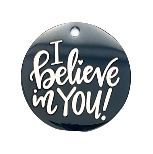 charm that says I believe in you black